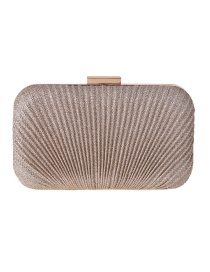 Fashion Champagne Hand Holding A Hard Shell Pleat Pack