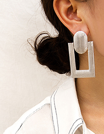 Fashion White K Hollow Square Bump Pleat Round Stitching Stud Earrings