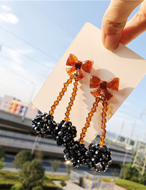 Fashion Black-brown Rice Beads Bow Earrings