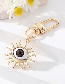 Fashion Sun Brown Eye Alloy Geometric Eye Sun Keychain