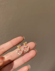 Fashion Gold Alloy Hollow Heart Stud Earrings