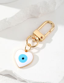 Fashion White Heart Alloy Dripping Oil Heart Eye Keychain