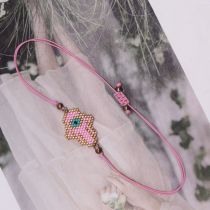 Fashion Pink Rice Beads Braided Eye Palm Bracelet