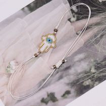 Fashion White Rice Beads Braided Eye Palm Bracelet