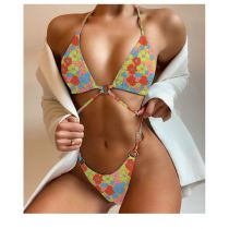 Fashion Yellow Background Printing Polyester Halterneck Hollow Split Swimsuit Bikini
